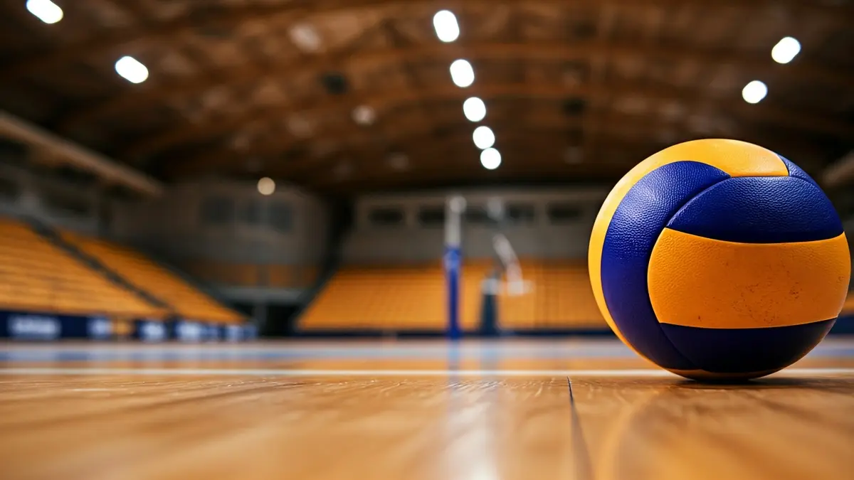 Generic image of a volleyball on a wooden court.