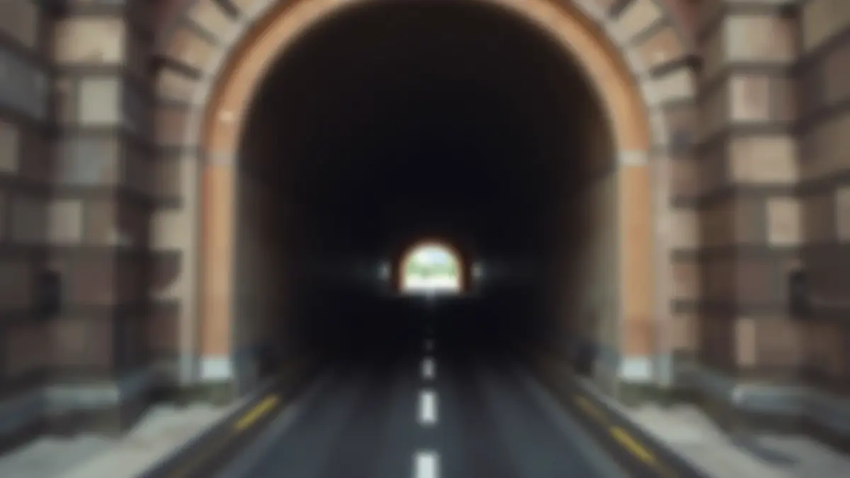 Abstract image of an unfinished tunnel entrance with a faint light at the end, symbolizing a pending project.