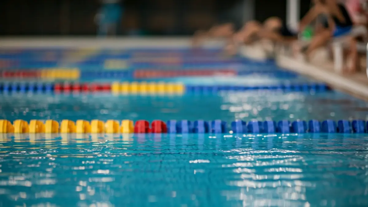 Generic image of an indoor swimming pool with young swimmers, representing a swimming competition.