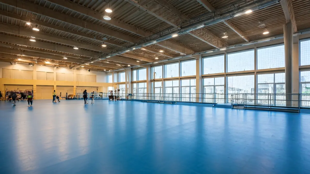 Image of a modernized sports hall with access ramps and sports equipment.