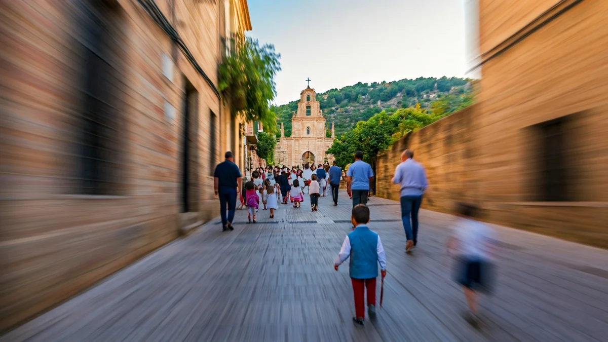 Image of a traditional pilgrimage with children and adults walking uphill.