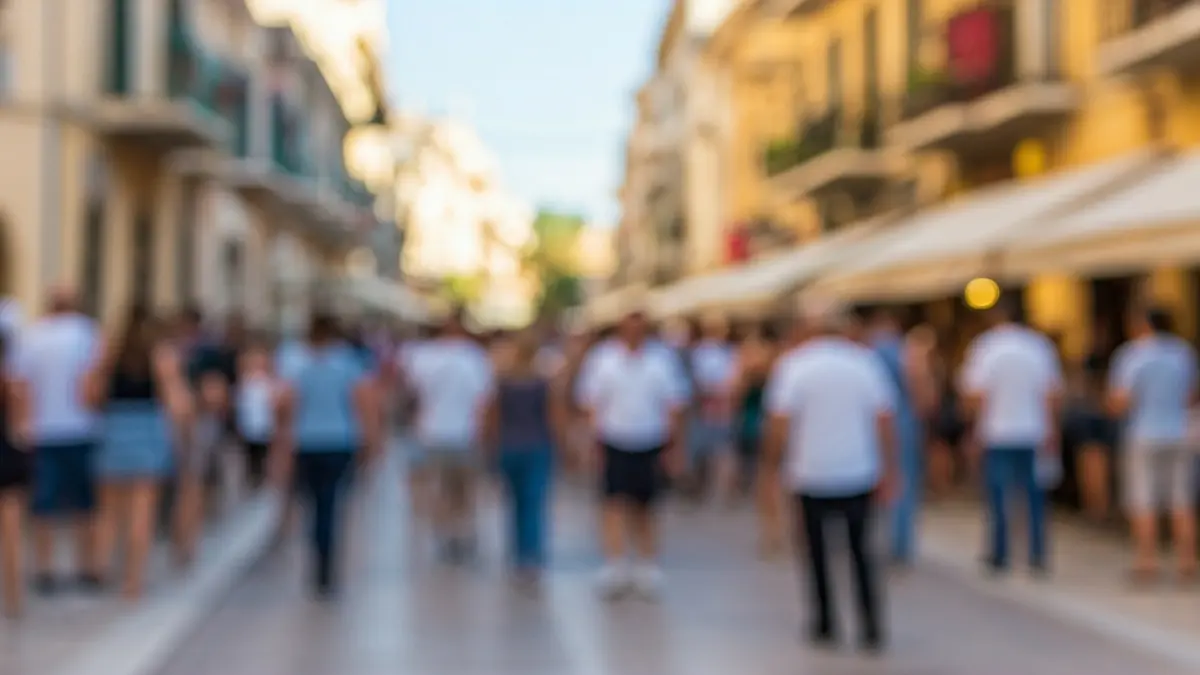 Imatge d'una trobada cultural festiva en un carrer mediterrani.