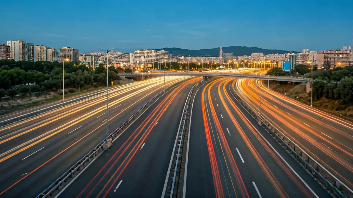 Generic image of a busy highway interchange with heavy morning traffic.
