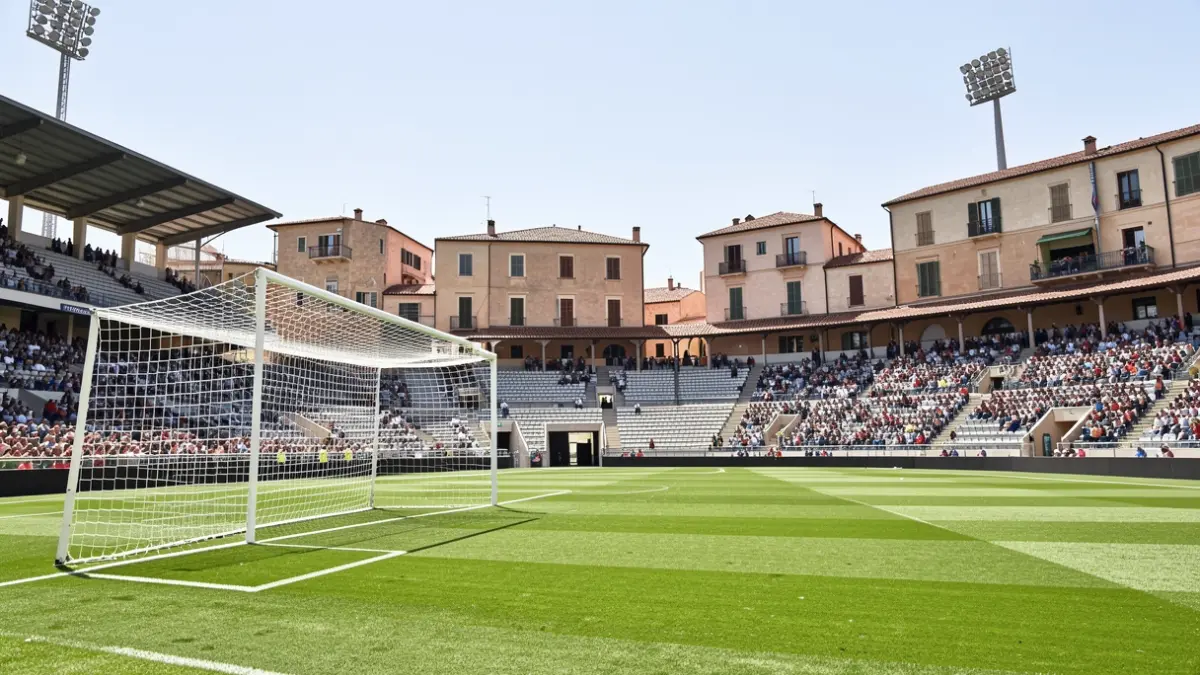 Imatge genèrica d'un estadi de futbol amb el camp verd i la porteria.