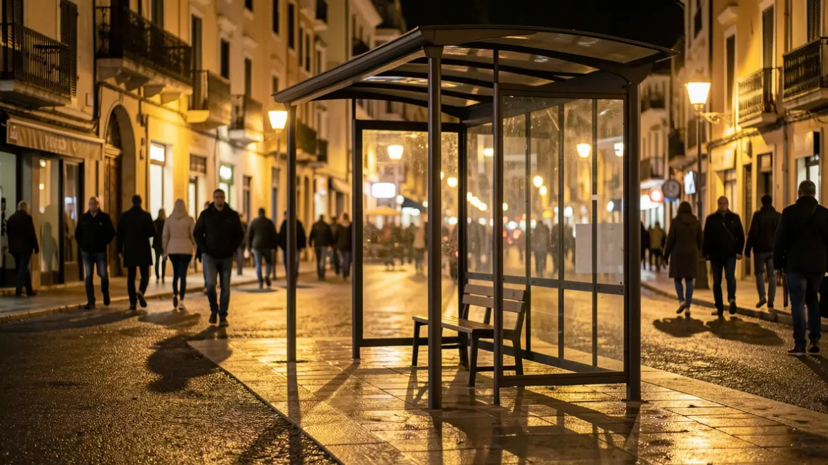 Generic image of a bus stop in a Mediterranean city at night.