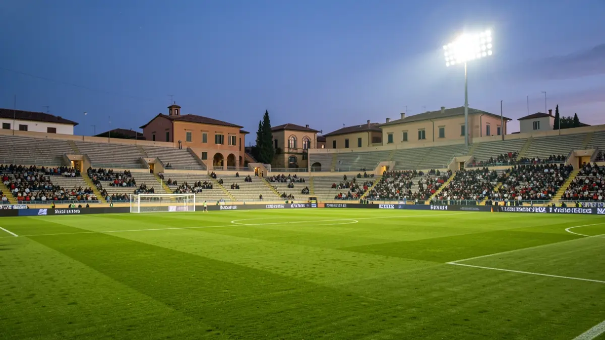 Generic image of an empty football stadium at dusk.
